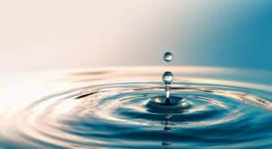 clear water drop with circular waves