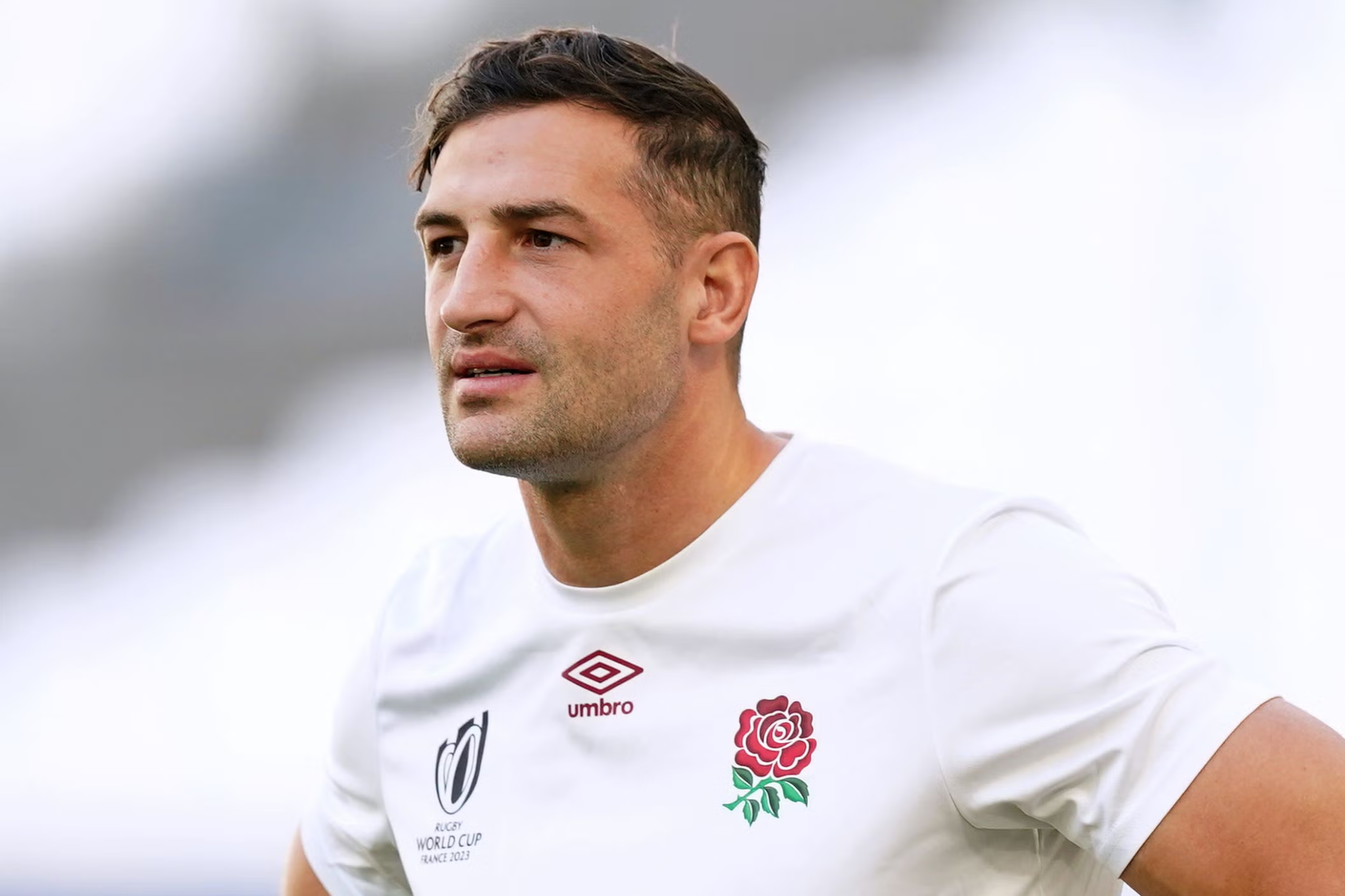 Jonny May wearing an England rugby shirt